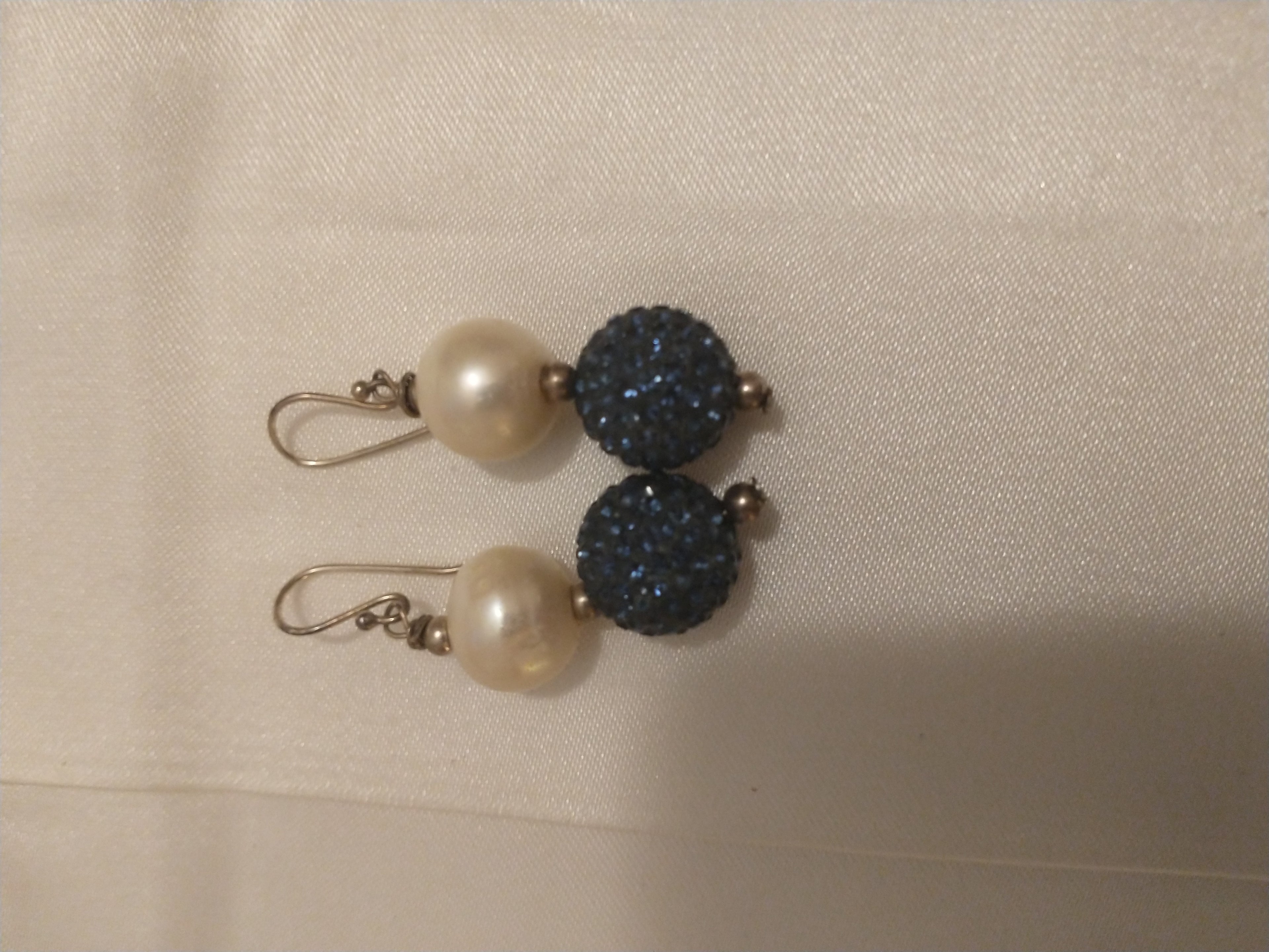 10mm Perfectly Round Freshwater Pearl with Sapphire Blue 10mm Swarovski pave bead earrings on a Sterling Silver wire. Pre-owned. SOLD AS IS ~ NO REFUNDS OR EXCHANGES
